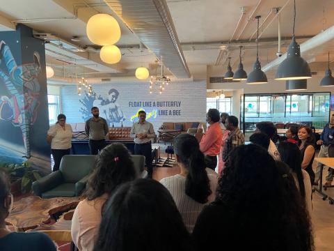 People gathered in a communal area at Jacobs' Banalore office