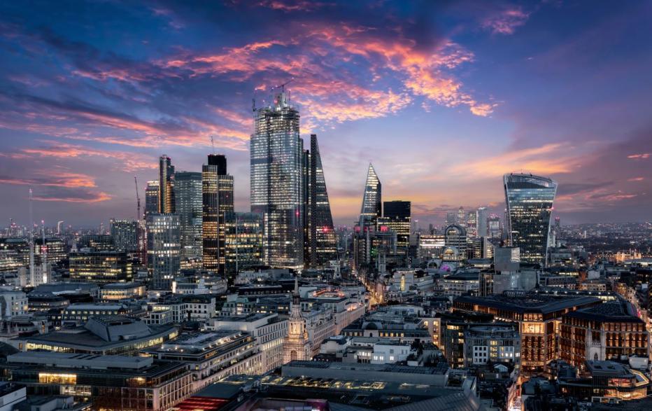 London skyline at dusk with purple sky