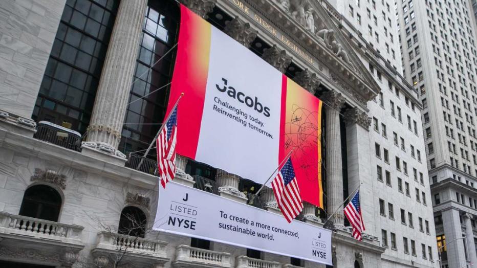 Jacobs banner handing on the front of the New York Stock Exchange