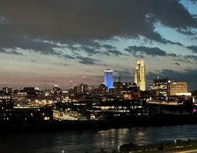 Missouri River through downtown Omaha at night